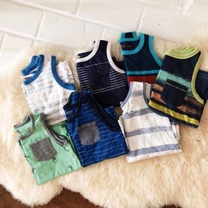 Bundle of boys sleeveless  shirts.
